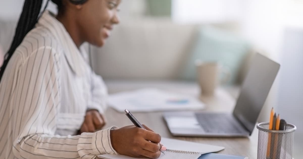 man studying at a laptop